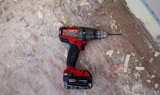 Workers drill